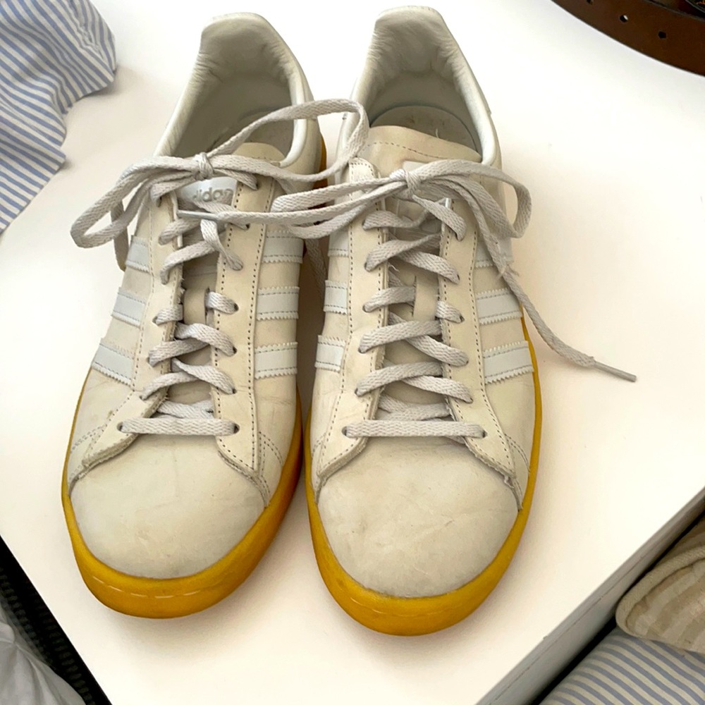 Adidas off white nubuck leather sneakers.